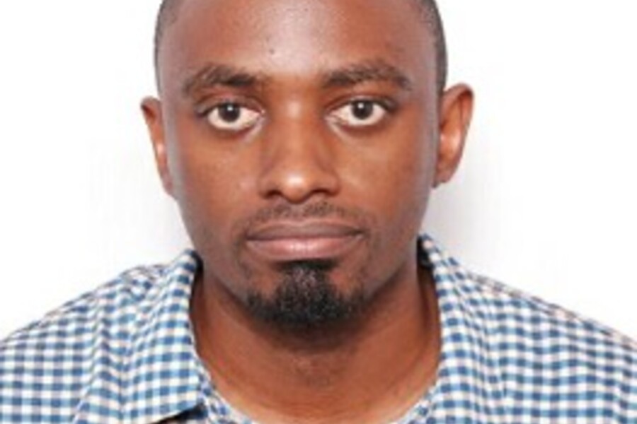 Headshot of Dr. Derrick Ssewanyana