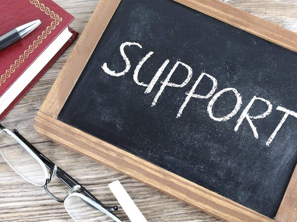 photo of a chalkboard with the word "support" on it.