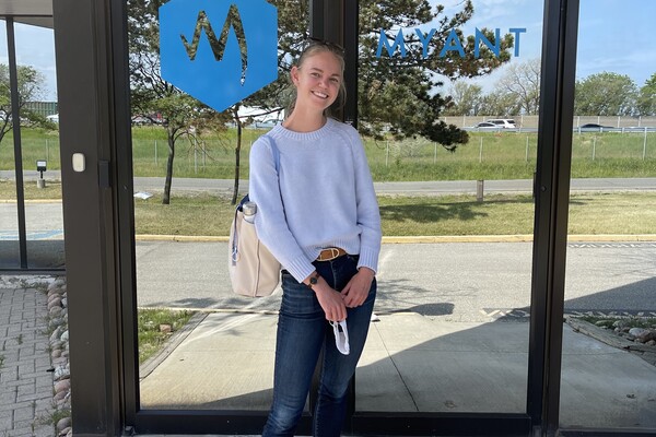 Photo of Katrina Innanen standing in front of the Myant office.