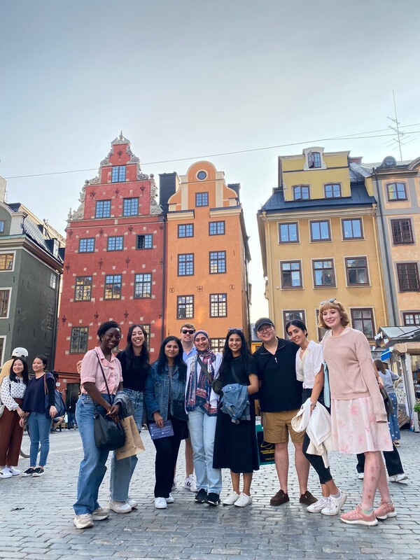students in front of pretty buildings in Stockholm