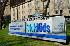 Photo of the SickKids Hospital sign in front of the hospital